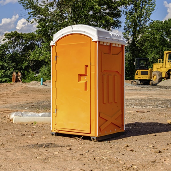 what is the cost difference between standard and deluxe portable restroom rentals in Omro WI